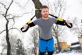 Suspension training system wrapped around a tree