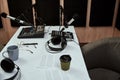 Working place of radio host. Close up of microphones, headphones, sound mixing desk, script on the table in recording Royalty Free Stock Photo