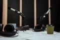 Working place of radio host. Close up of microphones, headphones and sound mixing desk on the table in recording studio Royalty Free Stock Photo