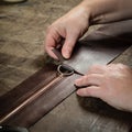 Working process of the leather bag Royalty Free Stock Photo