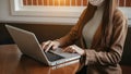 Working Process in Modern Office. Young Woman Account Manager Working at Wood Table with New Business Project. Typing keyboard, Royalty Free Stock Photo