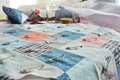 Working process: patchwork fabric cotton scraps and metal pins