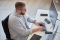 Working Professional Typing on Keyboard in Office Setting Royalty Free Stock Photo
