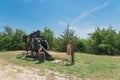 Working pump jack pumping crude oil at oil drilling site in rural USA Royalty Free Stock Photo