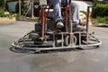 Working ride on power trowel machine on a concrete slab Royalty Free Stock Photo