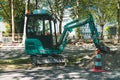 Mini excavator, Working on the road. Amsterdam Buitenveldert