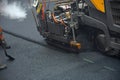 Working with road paving machine Royalty Free Stock Photo