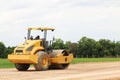 working road roller on ground