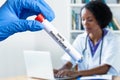 Working scientist with test tube of Omicron variant Royalty Free Stock Photo