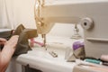 Working on sewing machine Royalty Free Stock Photo