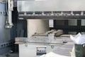 working with sheet metal on CNC hydraulic press brake. Bending sheet metal Royalty Free Stock Photo