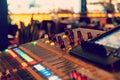 Working sound panel. Sound mixer. Professional audio mixing console with lights, buttons, faders and sliders Royalty Free Stock Photo