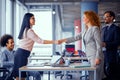 Two businesswomen shaking hands. Royalty Free Stock Photo