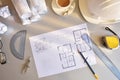 Working table of construction engineer with plan of project top Royalty Free Stock Photo