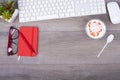 Working table with keyboard, notes, pen, glasses and ice cream i Royalty Free Stock Photo