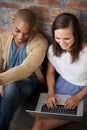 Working on their project after class. two students working on an assignment together. Royalty Free Stock Photo