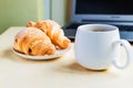 Working time, coffee break with croissant Royalty Free Stock Photo