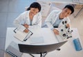 Working to make each other better. two lab workers together in their office. Royalty Free Stock Photo
