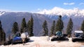 working tractor clears the road from snow on the mountain of the ski resort in Caucasus mountains on Krasnaya Polyana