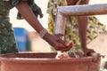 Working West African Young Girl getting Fresh Water for a lack of water symbol