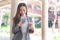 Working woman concept a young female manager attending video conference and holding a cup of coffee Royalty Free Stock Photo