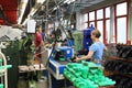 Working woman at the shoes factory