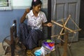 Working woman by weaving