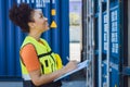 Working women happy staff worker  enjoy work checking container for delivery in logistic industry Royalty Free Stock Photo