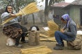 Working women make brooms in traditional way