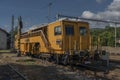 Working yellow train in Kysak station in summer nice sunny day