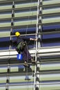 Workman Abseiling a Building Royalty Free Stock Photo