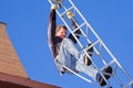 Workman installing HDTV digital antenna Royalty Free Stock Photo