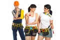 Workman looking to two workers women Royalty Free Stock Photo