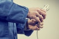 Workman repairing an electric cable