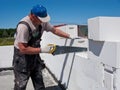 Workman sawing blocks Royalty Free Stock Photo