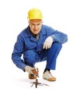 Workman sitting on the floor