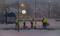Workmans with shovel in snowy morning in Ceske Budejovice station CZ 02 12 2023
