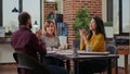 Workmates applauding and supporting motivated woman