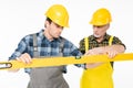 Workmen with level tool Royalty Free Stock Photo