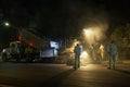 Workmen at night shift roadworks Royalty Free Stock Photo