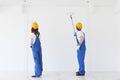 Workmen painting wall Royalty Free Stock Photo