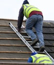 Workmen on the roof Royalty Free Stock Photo