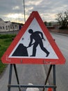 Workmen triangular road sign with red border UK