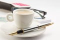 Workong environment white table or place with cup of coffee glasses pen calculator and money Royalty Free Stock Photo