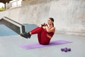 Workout. Fitness Girl Doing Abdominal Exercise On Yoga Mat At Outdoor Stadium. Fit Woman With Sexy Muscular Body. Royalty Free Stock Photo