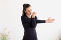 Workout at home.Athletic woman in sportswear doing stretching exercises at home in the living room. Royalty Free Stock Photo