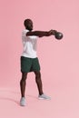 Workout. Man doing kettlebell swing exercise, sports training Royalty Free Stock Photo