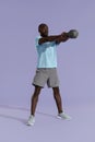 Workout. Man doing kettlebell swing exercise, sports training Royalty Free Stock Photo