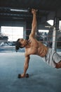 Workout. Man With Dumbbells Doing Side Plank On Boxing Ring. Shirtless Asian Sportsman Training At Gym. Topless Sexy Guy