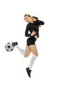 Workout. One sportive girl, female soccer player practicing with football ball isolated on white studio background Royalty Free Stock Photo